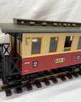 LGB 3011 2rd Class Passenger Coach G Scale Red with seated people. LN/Box