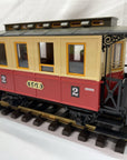 LGB 3011 2rd Class Passenger Coach G Scale Red with seated people. LN/Box