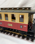 LGB 3011 2rd Class Passenger Coach G Scale Red with seated people. LN/Box