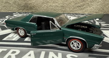 1965 Pontiac GTO WELLY 22092 Metallic Green 1:24 G SCALE DIECAST CAR LN/no box